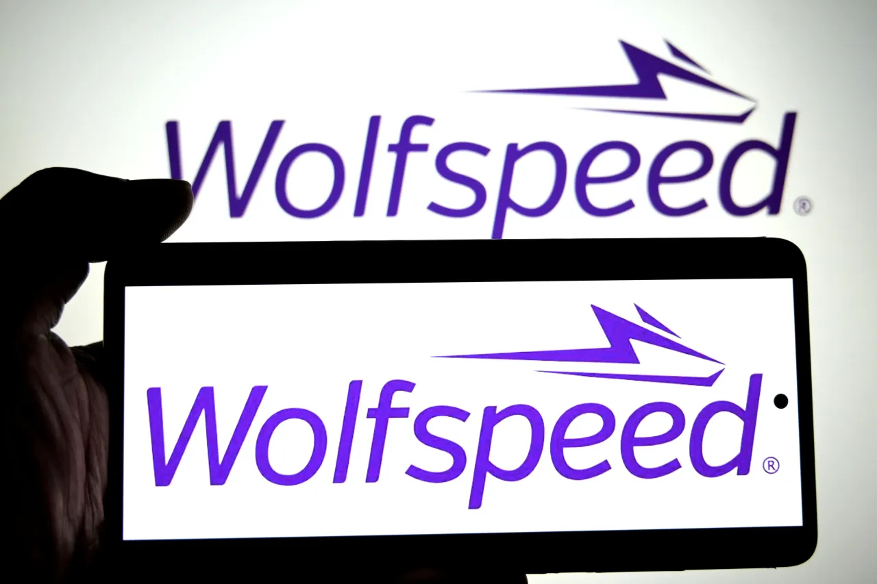 ‘In this photo illustration, a Wolfspeed logo is seen displayed on a smartphone and in the background.