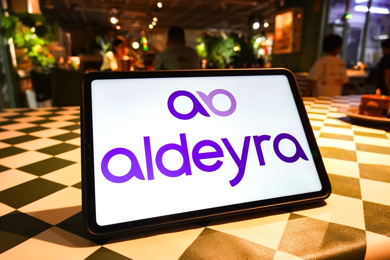 In this photo illustration, the Aldeyra Therapeutics logo is seen displayed on the screen of a tablet. (Photo Illustration by Sheldon Cooper/SOPA Images/LightRocket via Getty Images)