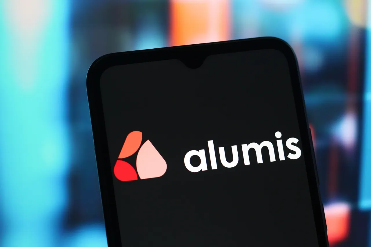 In this photo illustration, the Alumis logo is seen displayed on a smartphone screen. (Photo Illustration by Thomas Fuller/SOPA Images/LightRocket via Getty Images)