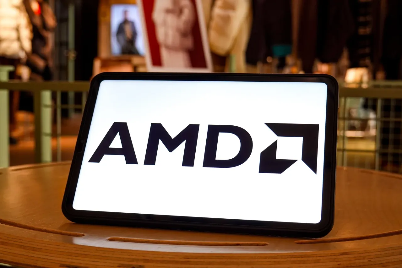 In this photo illustration, the AMD logo is seen displayed on the screen of a tablet