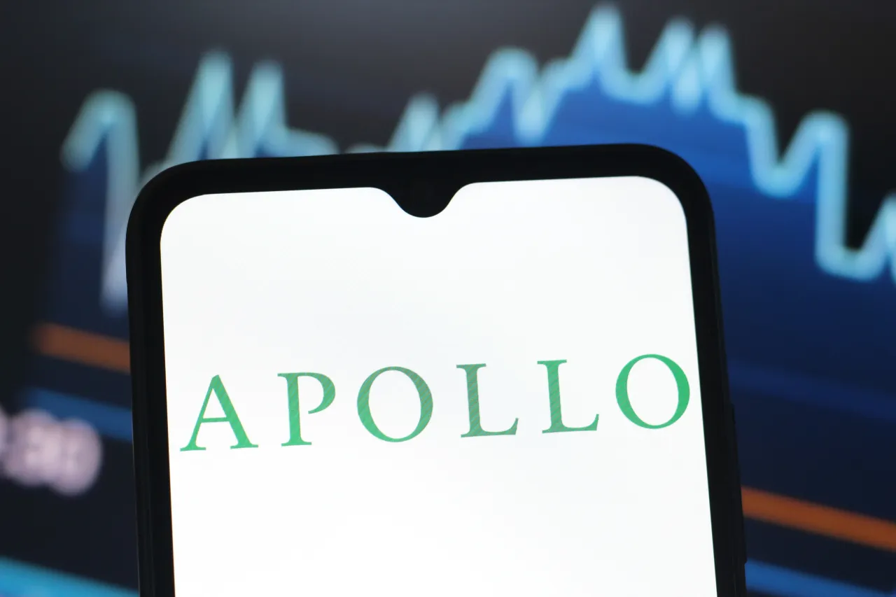 In this photo illustration, the Apollo Global Management logo is seen displayed on a smartphone screen. (Photo Illustration by Thomas Fuller/SOPA Images/LightRocket via Getty Images)
