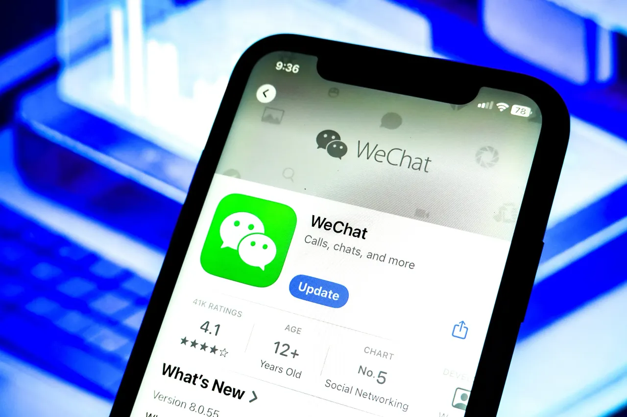 In this photo illustration, the WeChat app logo is displayed on an iPhone in the Apple Store.