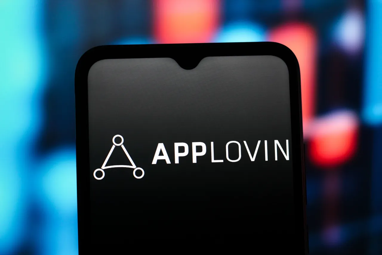  In this photo illustration, the AppLovin Corporation logo is seen displayed on a smartphone screen. (Photo Illustration by Thomas Fuller/SOPA Images/LightRocket via Getty Images)