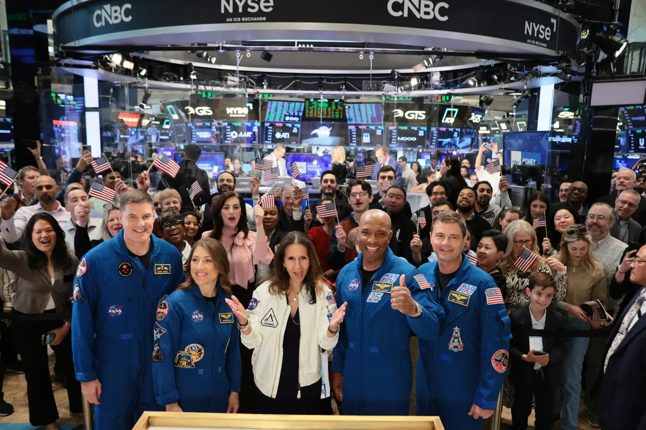 The Artemis II astronauts take photos with NYSE employees as they visit the New York Stock Exchange on May 01, 2026 in New York City. (Photo by Michael M. Santiago/Getty Images)