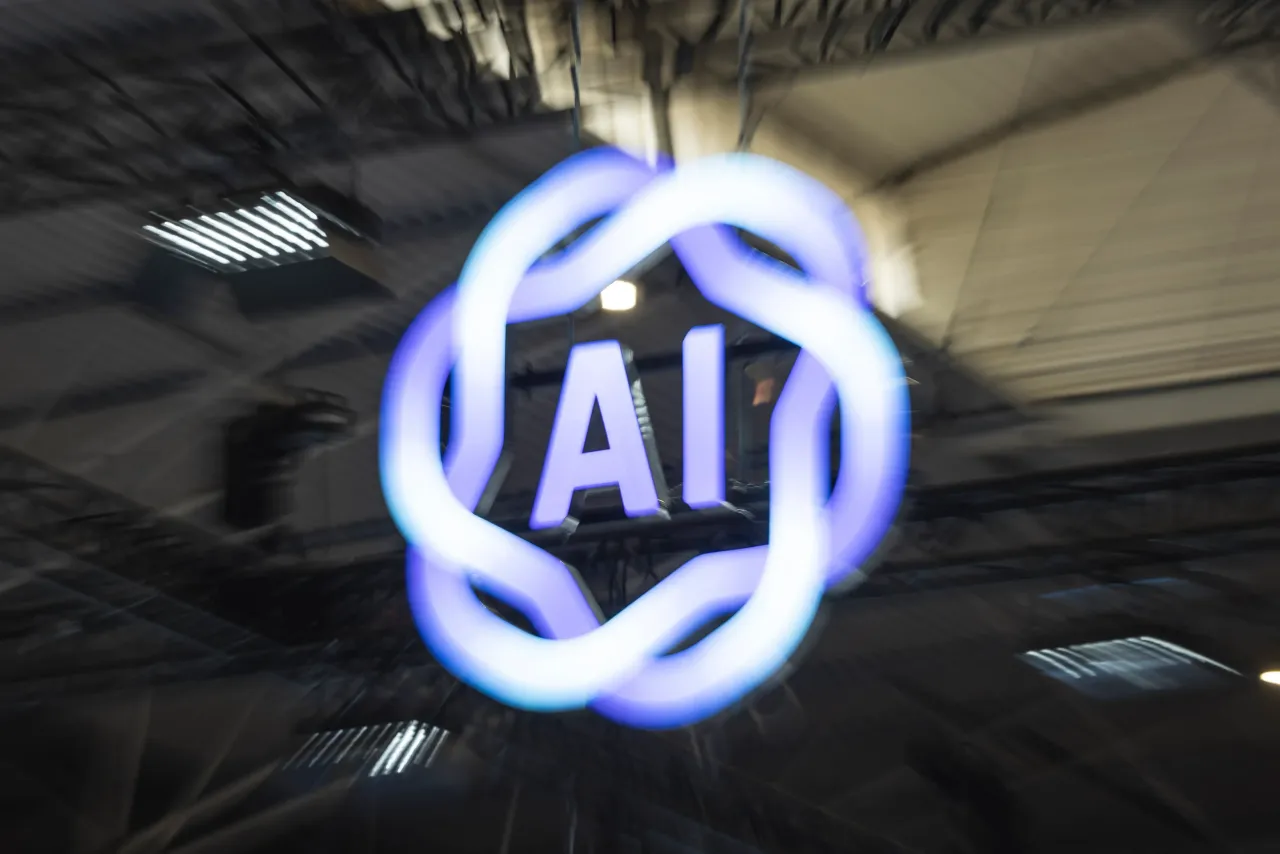 An artificial intelligence (AI) sign sits illuminated at Mobile World Congress 2025 on March 6, 2025 in Barcelona, Spain
