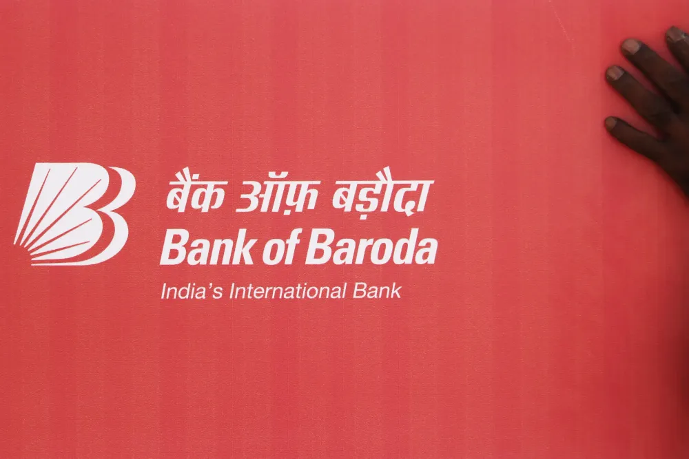 A man holds a banner of Bank of Baroda in Mumbai, India on 04 May 2019. As the public sector bank has celebrated his centennial anniversary of Mumbai Zone. (Photo by Himanshu Bhatt/NurPhoto via Getty Images)