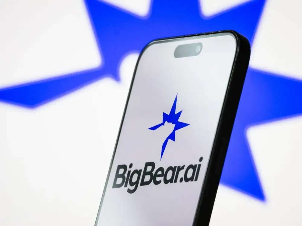 In this photo illustration, the logo of BigBear.ai Holdings, Inc. is displayed on a smartphone screen.