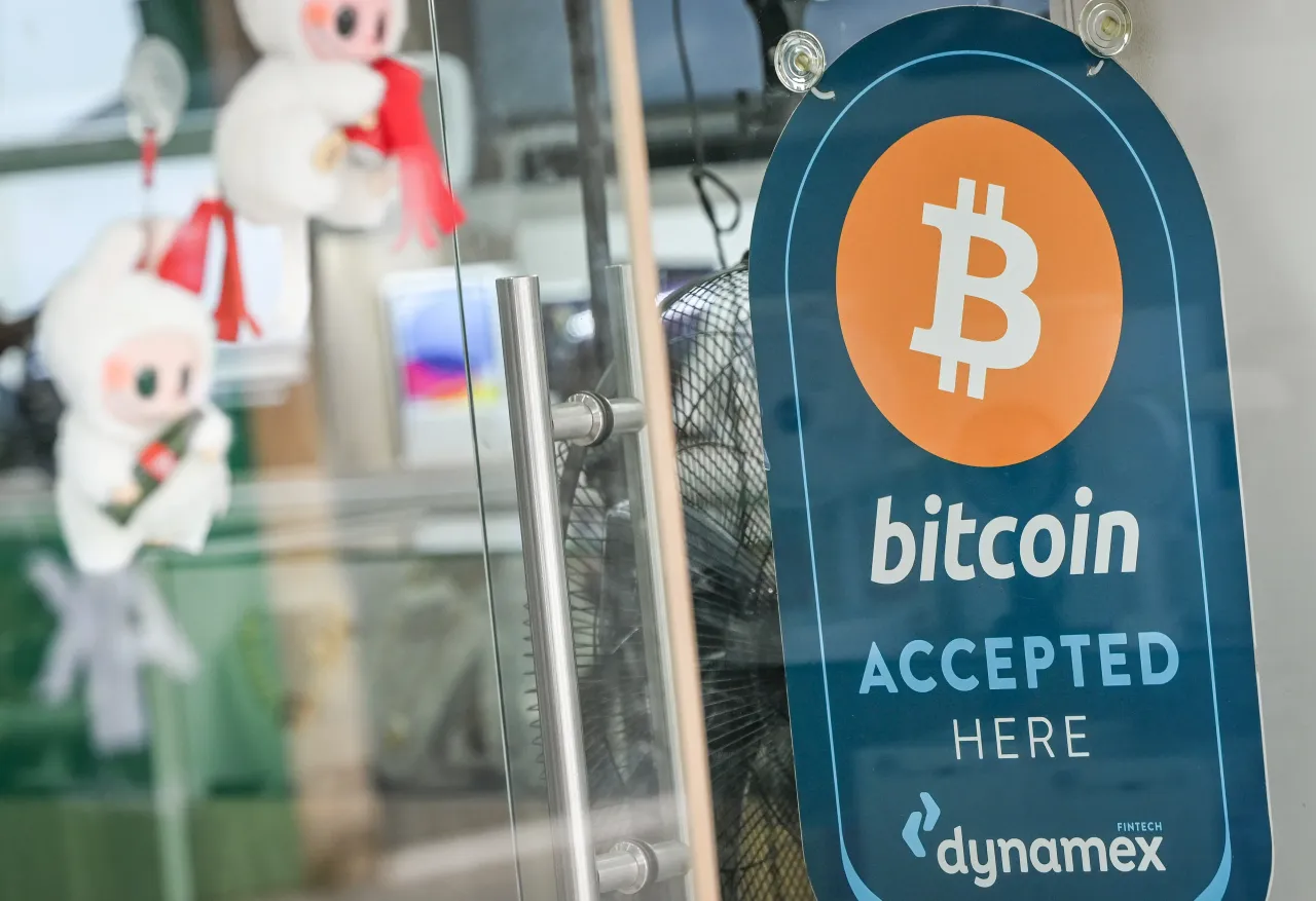 A sign reading 'Bitcoin Accepted Here' is seen in the northern part of Nicosia, administered by the self-declared Turkish Republic of Northern Cyprus (TRNC), on October 21, 2025. (Photo by STR/NurPhoto via Getty Images)