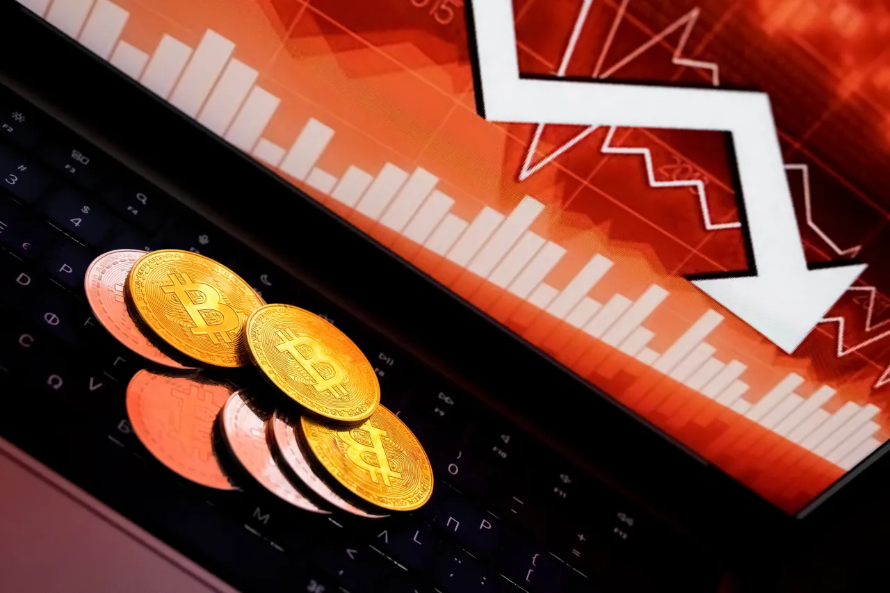 Bitcoin style symbol with negative chart data simulating a drop in the price. Concept piece for Bitcoin crash, failing, falling, negative price action, falling value, ban and regulation.