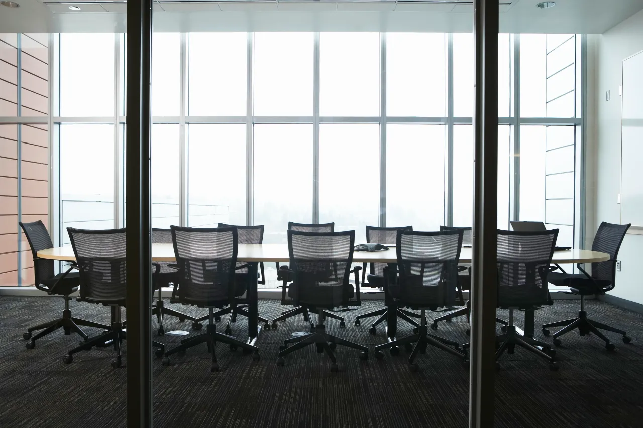 Representative image of a boardroom. (Photo by Thomas Northcut/Getty Images)