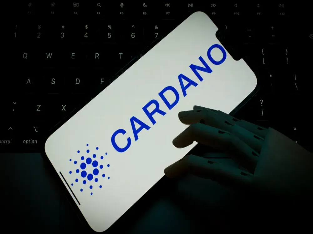 Cardano logo is seen on the screen of a mobile device in this photo illustration taken on 01 November, 2023 in Warsaw, Poland. (Photo by Jaap Arriens/NurPhoto via Getty Images)