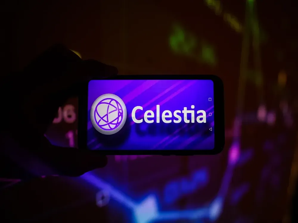 In this photo illustration, a Celestia logo is displayed on a smartphone with stock market percentages on the background. (Photo Illustration by Omar Marques/SOPA Images/LightRocket via Getty Images)