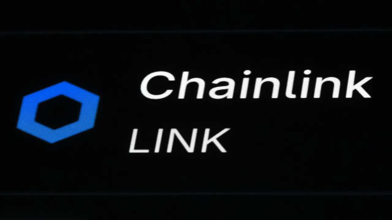 The cryptocurrency Chainlink can be seen on the display of an iPhone in the crypto trading platform Koingecko. (Photo by Silas Stein/picture alliance via Getty Images)