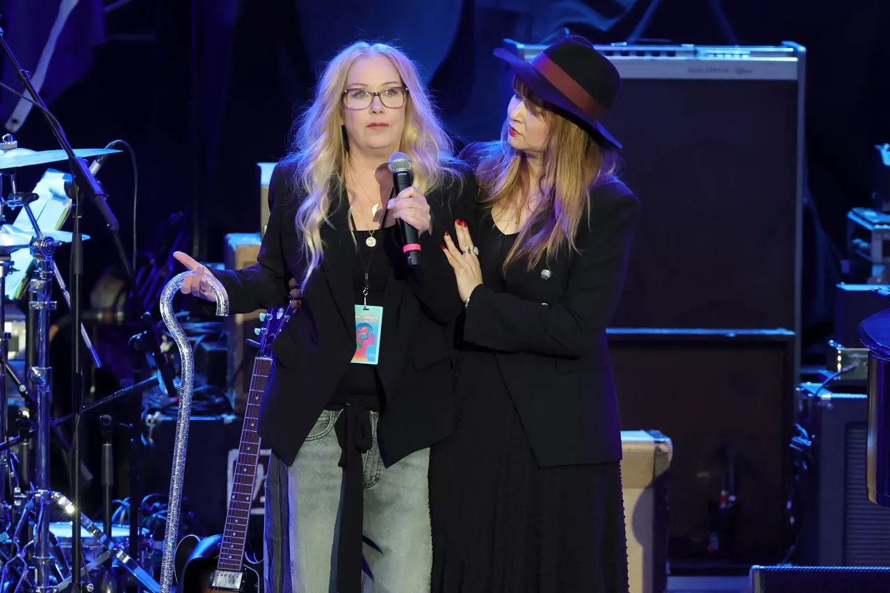 Christina Applegate (L) speaks onstage during the Light Up The Blues 7 Concert celebrating Autism Speaks' 20th Anniversary at the Greek Theatre on April 26, 2025 in Los Angeles, California. (Photo by Kevin Winter/Getty Images)
