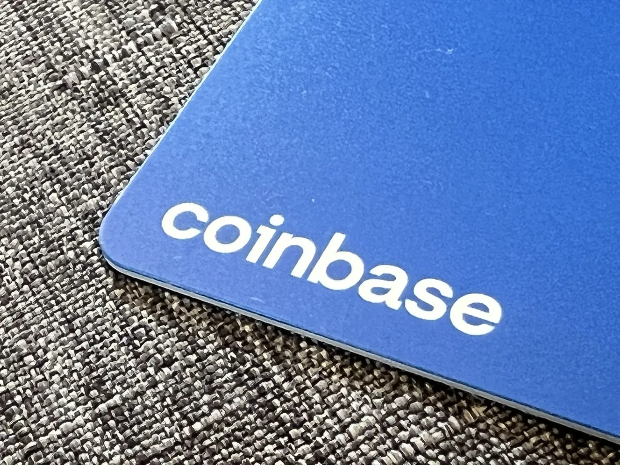 Logo for cryptocurrency exchange Coinbase on debit card edge, Lafayette, California, June 4, 2022. (Photo by Smith Collection/Gado/Getty Images)