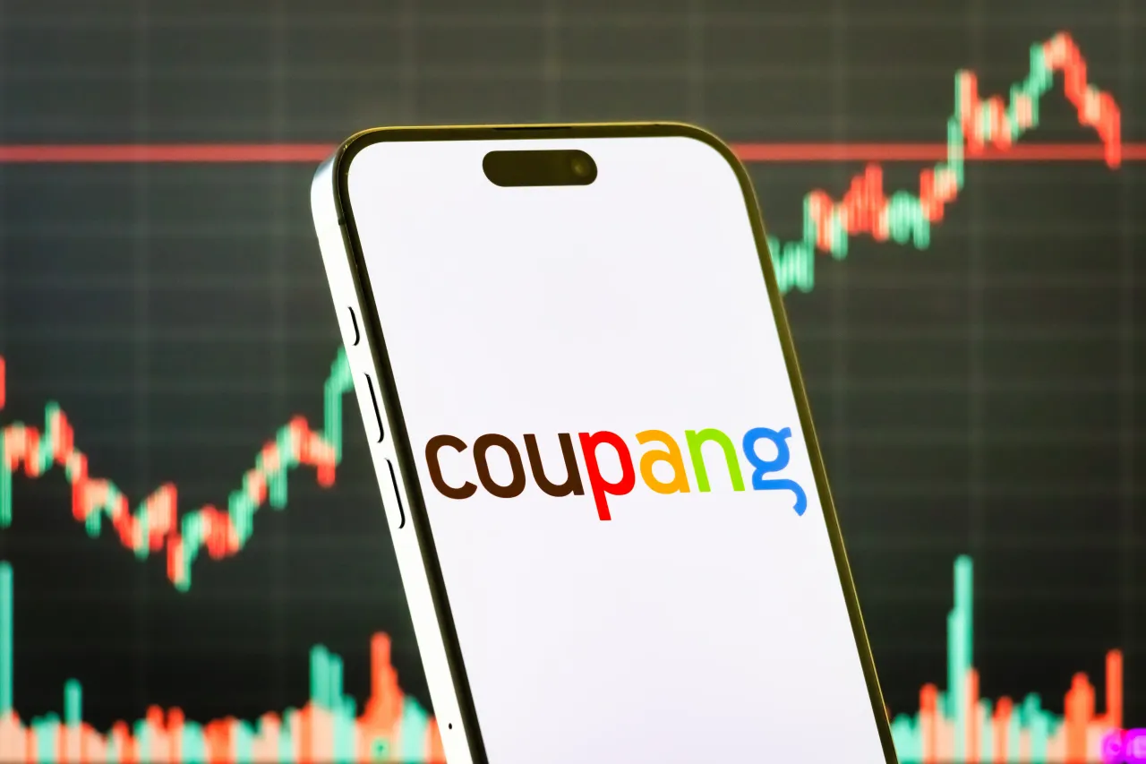 In this photo illustration, a smartphone displays the logo of Coupang Inc. on July 31, 2025. (Photo illustration by Cheng Xin/Getty Images)