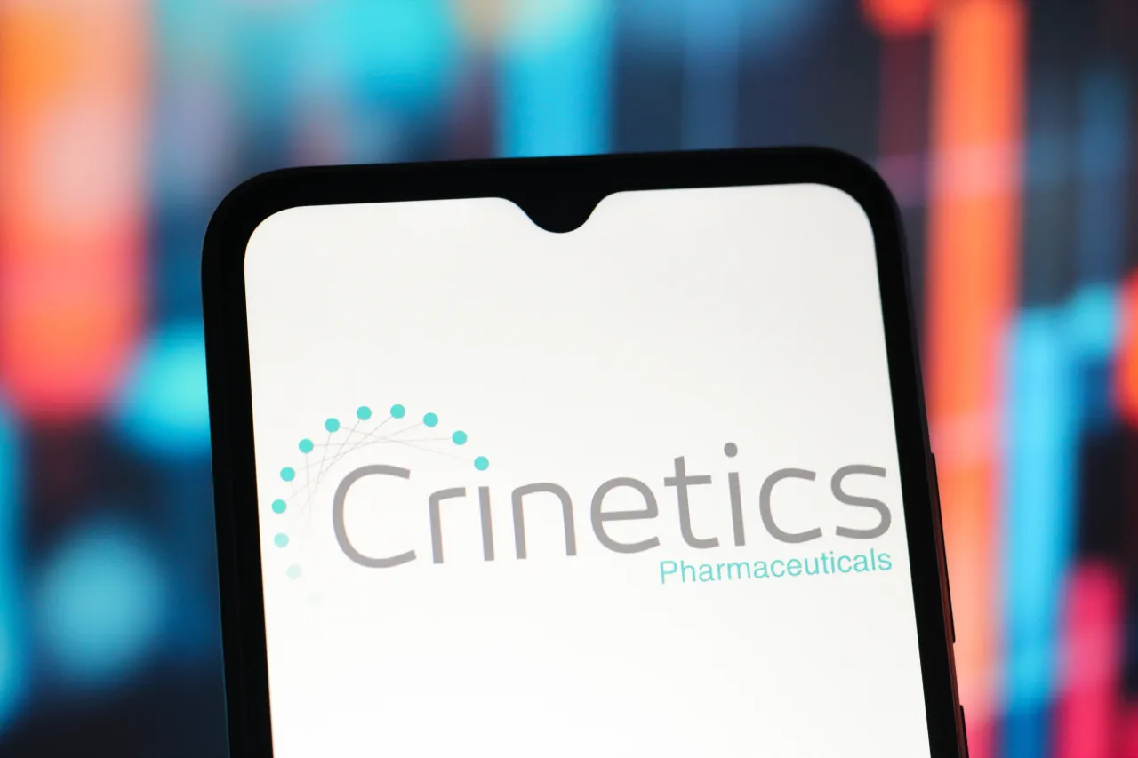 In this photo illustration, the Crinetics Pharmaceuticals logo is seen displayed on a smartphone screen. (Photo Illustration by Thomas Fuller/SOPA Images/LightRocket via Getty Images)