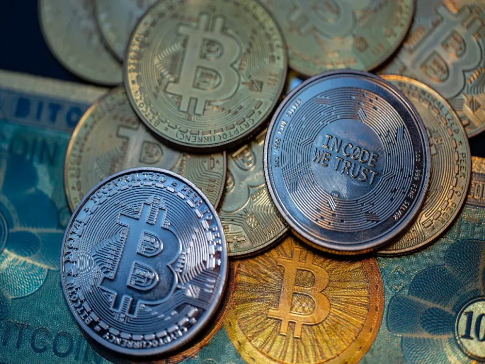 Bitcoin logo displayed on mobile with representation of Bitcoins cryptocurrencies seen in this photo illustration. on 17 January 2023 in Brussels, Belgium. (Photo illustration by Jonathan Raa/NurPhoto via Getty Images)