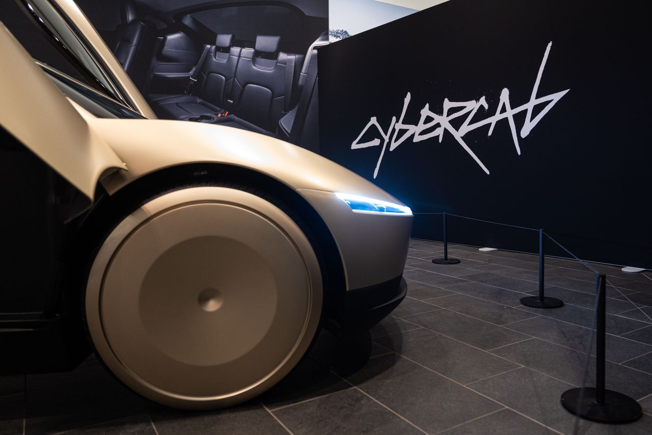 A prototype of the Tesla Cybercab stands in a showroom in the Mall of Berlin. The logo can be seen in the background. Photo: Hannes P. Albert/dpa (Photo by Hannes P Albert/picture alliance via Getty Images)