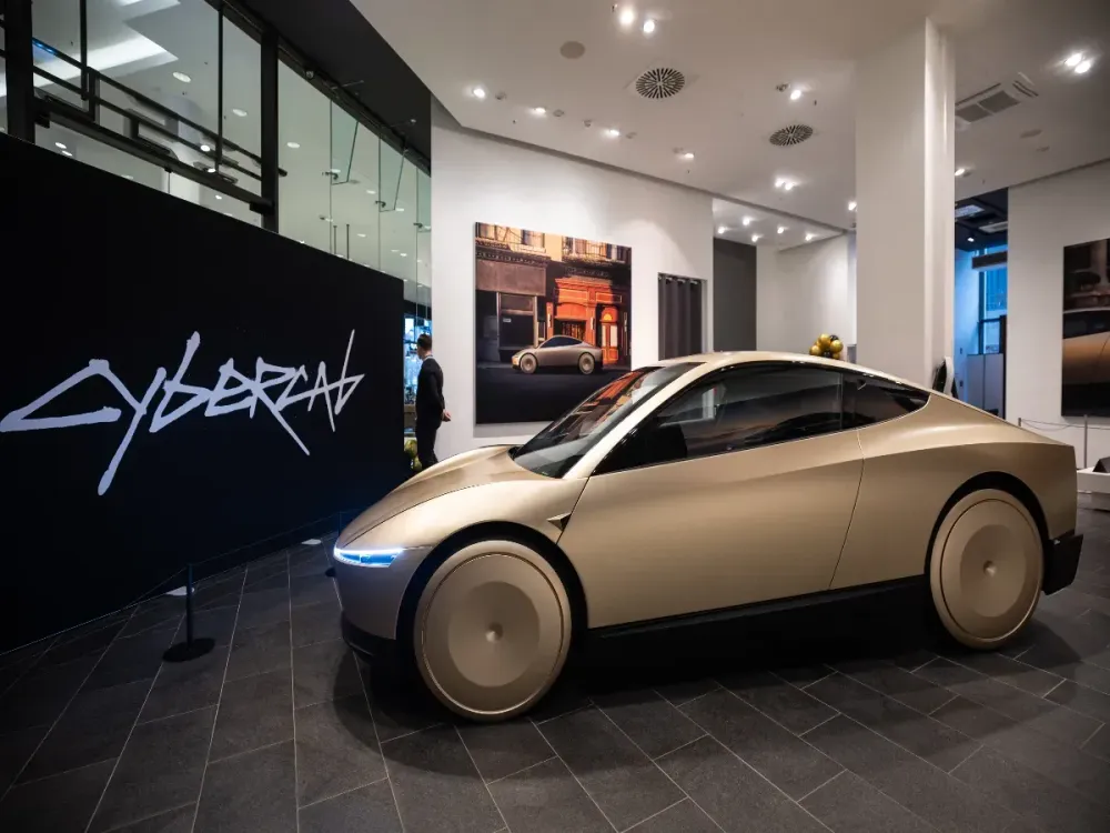 A prototype of the Tesla Cybercab stands in a showroom in the Mall of Berlin. Photo: Hannes P. Albert/dpa (Photo by Hannes P Albert/picture alliance via Getty Images)
