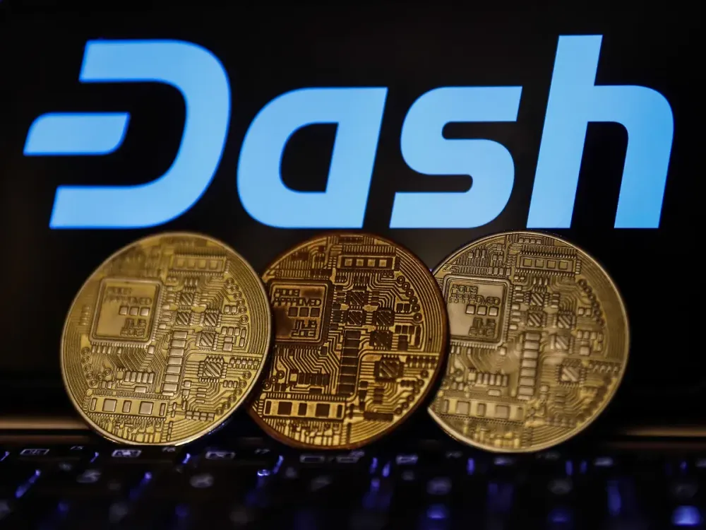 Dash logo displayed on a phone screen and representation of cryptocurrency are seen in this illustration photo taken in Krakow, Poland on November 6, 2021. (Photo by Jakub Porzycki/NurPhoto via Getty Images)