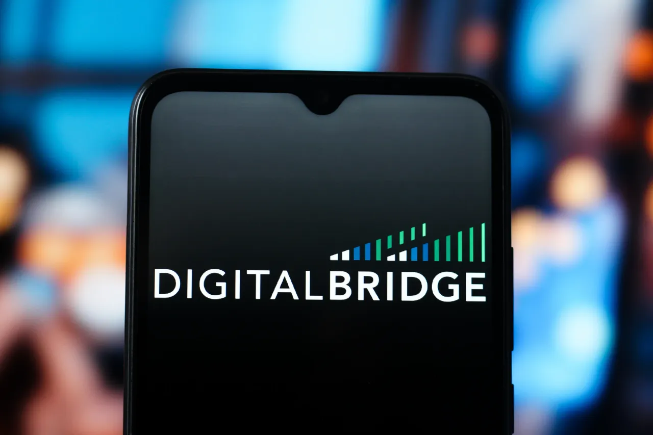 In this photo illustration, the DigitalBridge logo is seen displayed on a smartphone screen