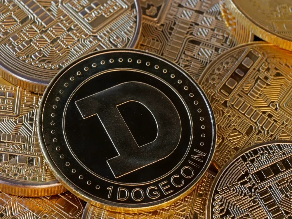  In this photo illustration, a visual representation of the digital Cryptocurrency, Dogecoin (DOGE) is on display on November 12, 2024 in Paris, France. (Photo illustration by Chesnot/Getty Images)