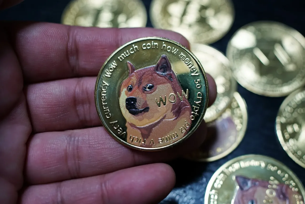 A souvenir Doge coin in the hand of a collector of souvenirs of crypto currencies in Shanghai, China Friday, Feb. 07, 2025. (WANG GANG / Feature China/Future Publishing via Getty Images)