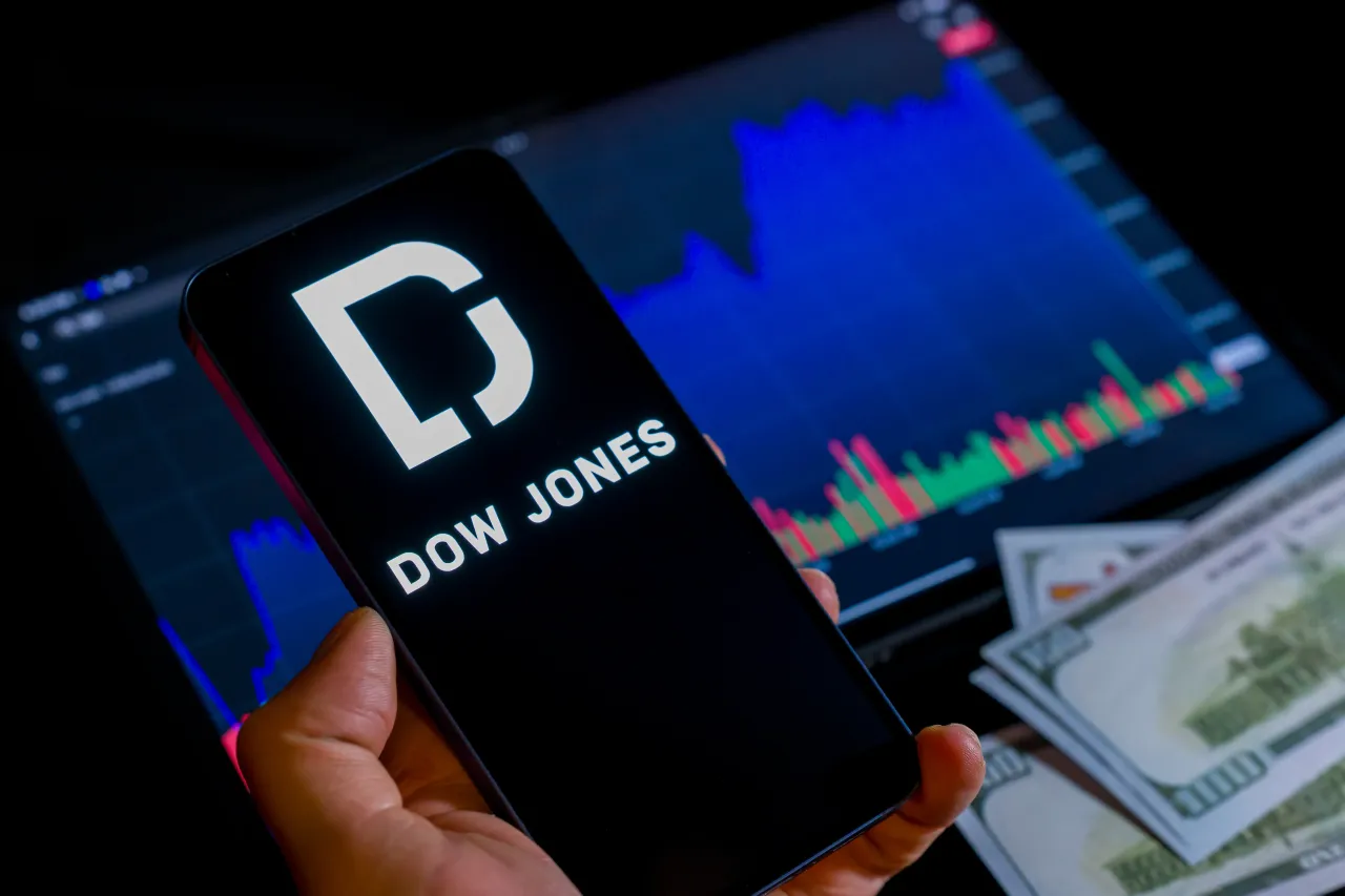 The Dow Jones Industrial Average closes above the 50,000 mark for the first time ever, seen in this photo illustration in Brussels, Belgium, on February 7, 2026. (Photo Illustration by Jonathan Raa/NurPhoto via Getty Images)