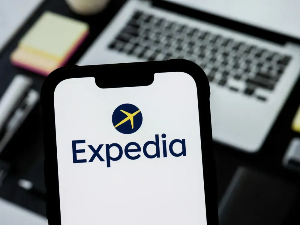 In this photo illustration, a Expedia logo seen displayed on a smartphone. (Photo Illustration by Mateusz Slodkowski/SOPA Images/LightRocket via Getty Images)