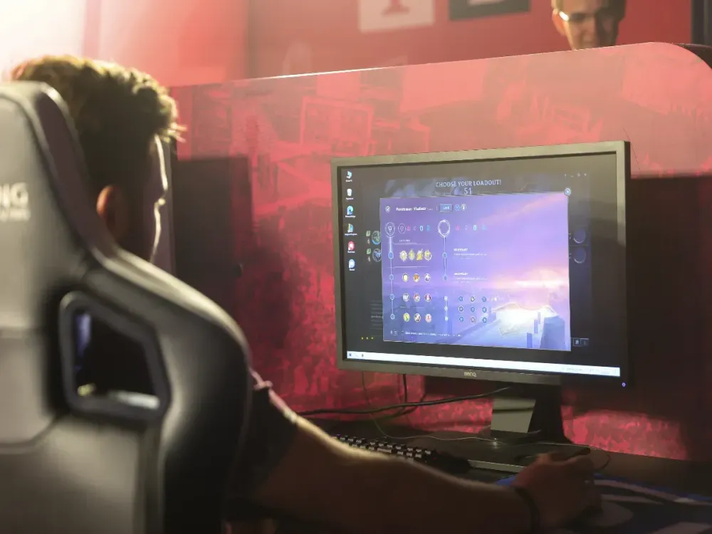 A man plays the computer game League of Legends on a PC during the Prime League finals at Arena Berlin. (Photo by Gerald Matzka/picture alliance via Getty Images)