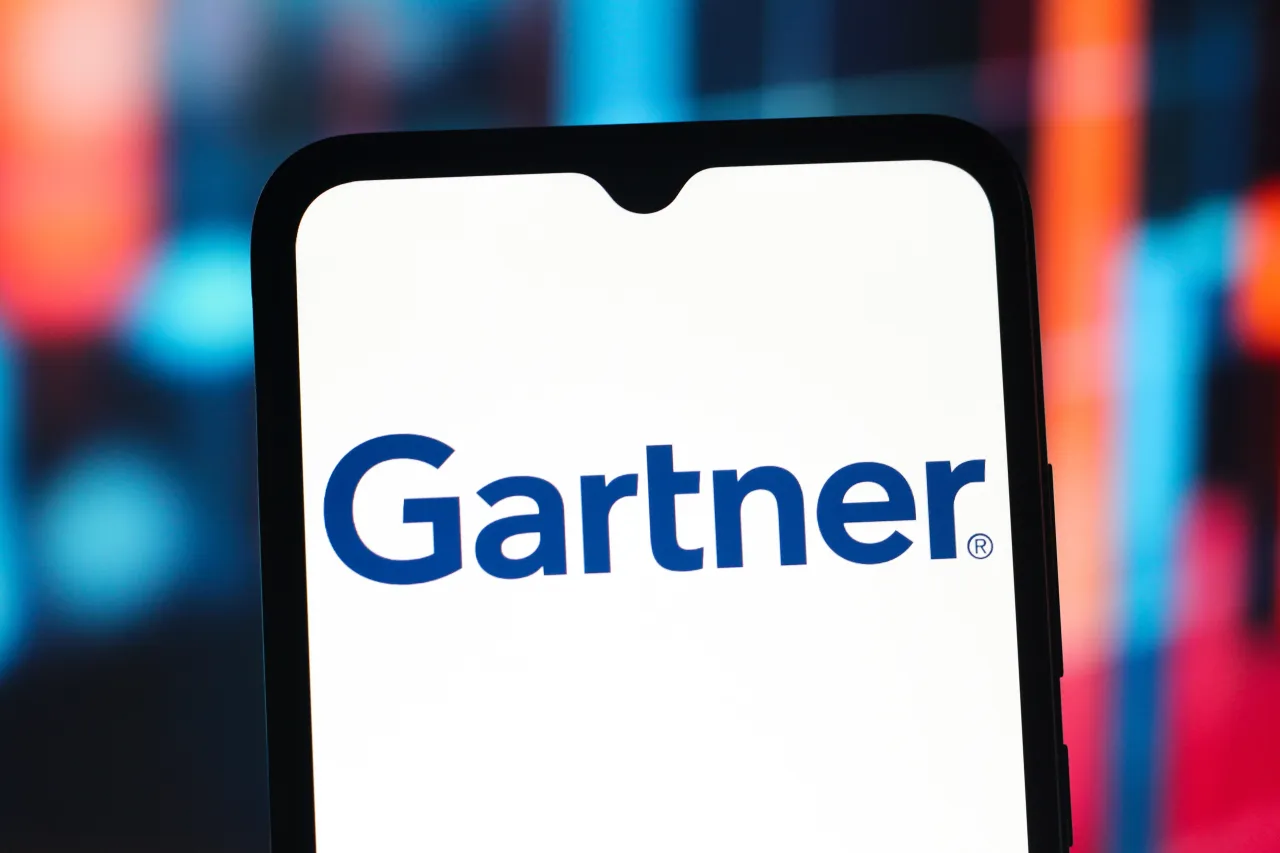 In this photo illustration, the Gartner Group logo is seen displayed on a smartphone screen. 