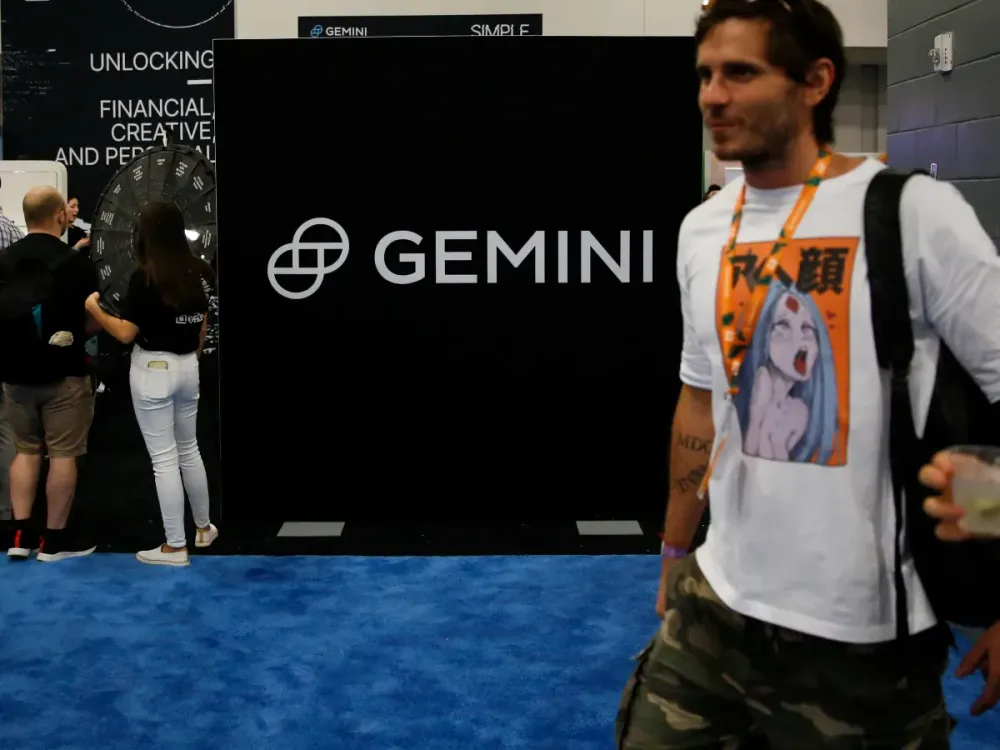 The logo of Gemini Trust Company is seen at its stand in the exhibition hall during the Bitcoin 2022 Conference at Miami Beach Convention Center on April 7, 2022 in Miami, Florida. (Photo by Marco Bello/Getty Images)