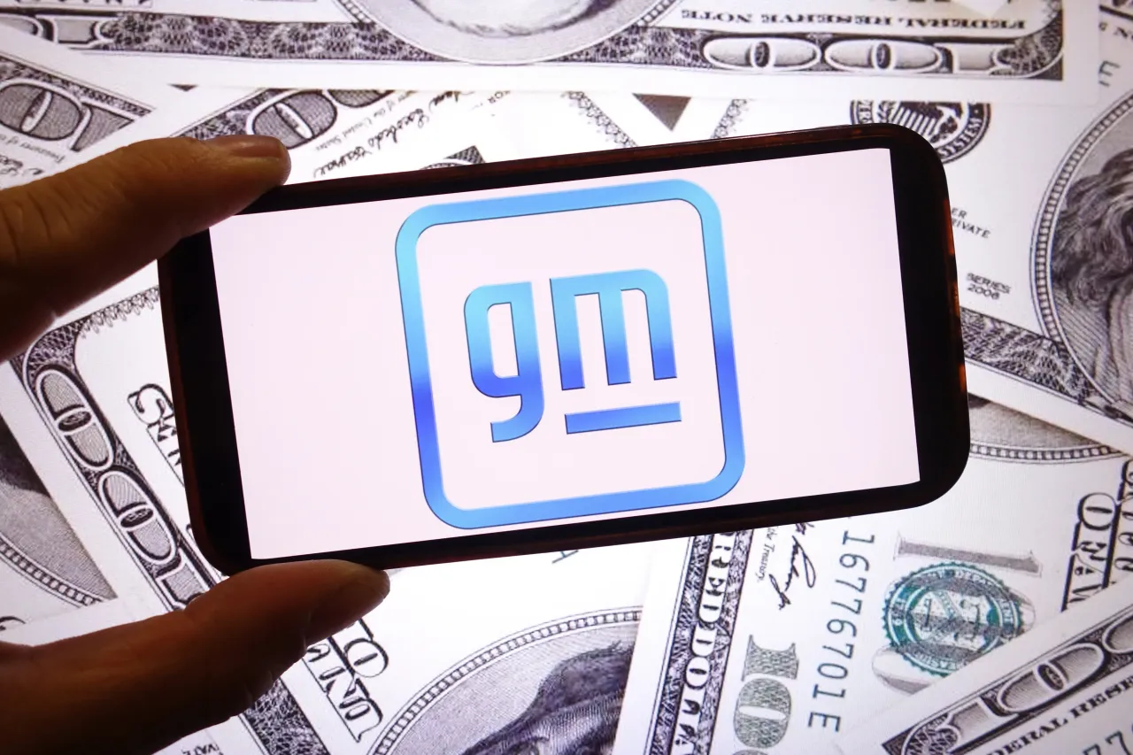 In this photo illustration, the General Motors company logo is seen displayed on a smartphone screen. (Photo Illustration by Piotr Swat/SOPA Images/LightRocket via Getty Images)