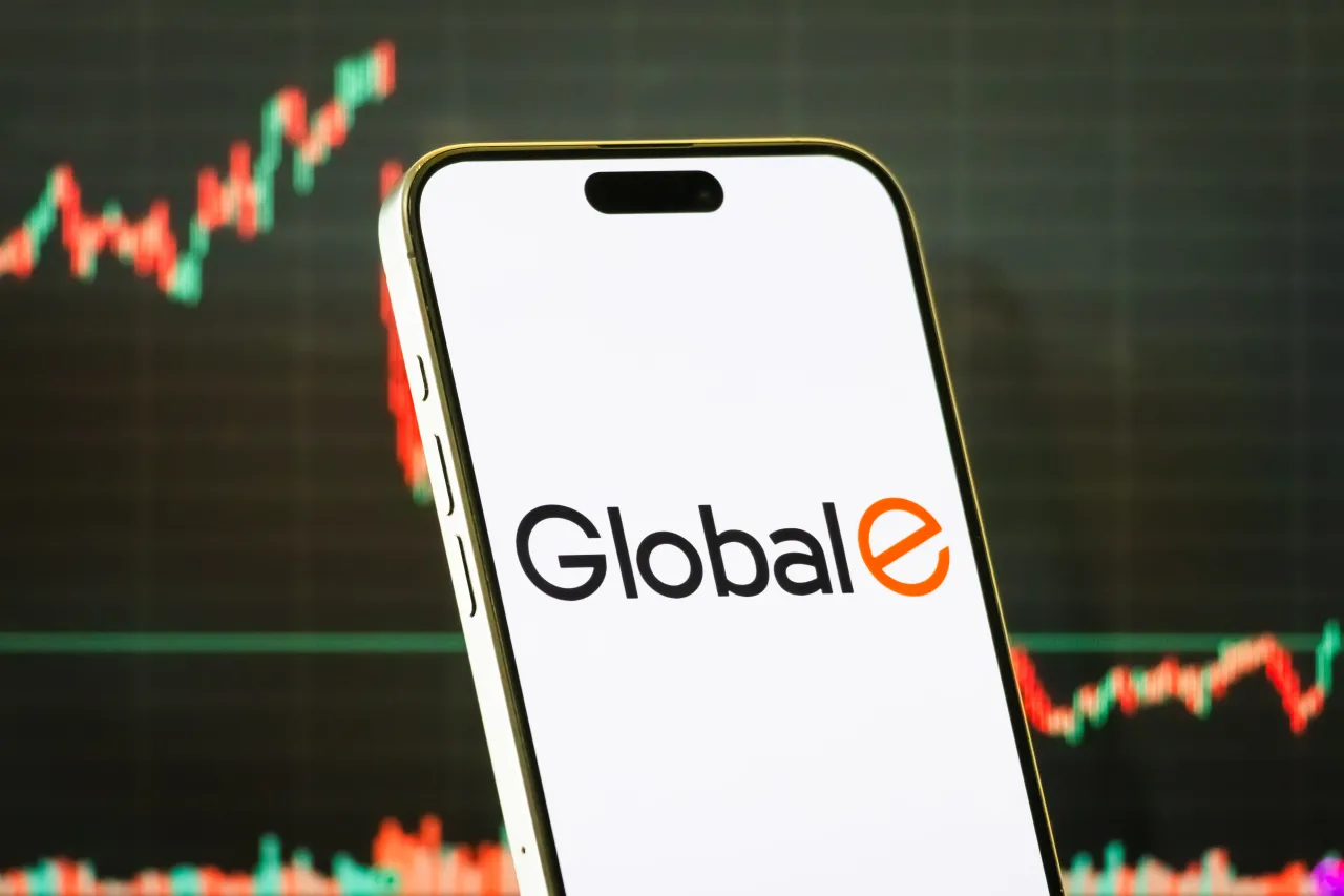 In this photo illustration, a smartphone displays the logo of Global-e Online, a leading cross-border e-commerce platform enabling global direct-to-consumer sales