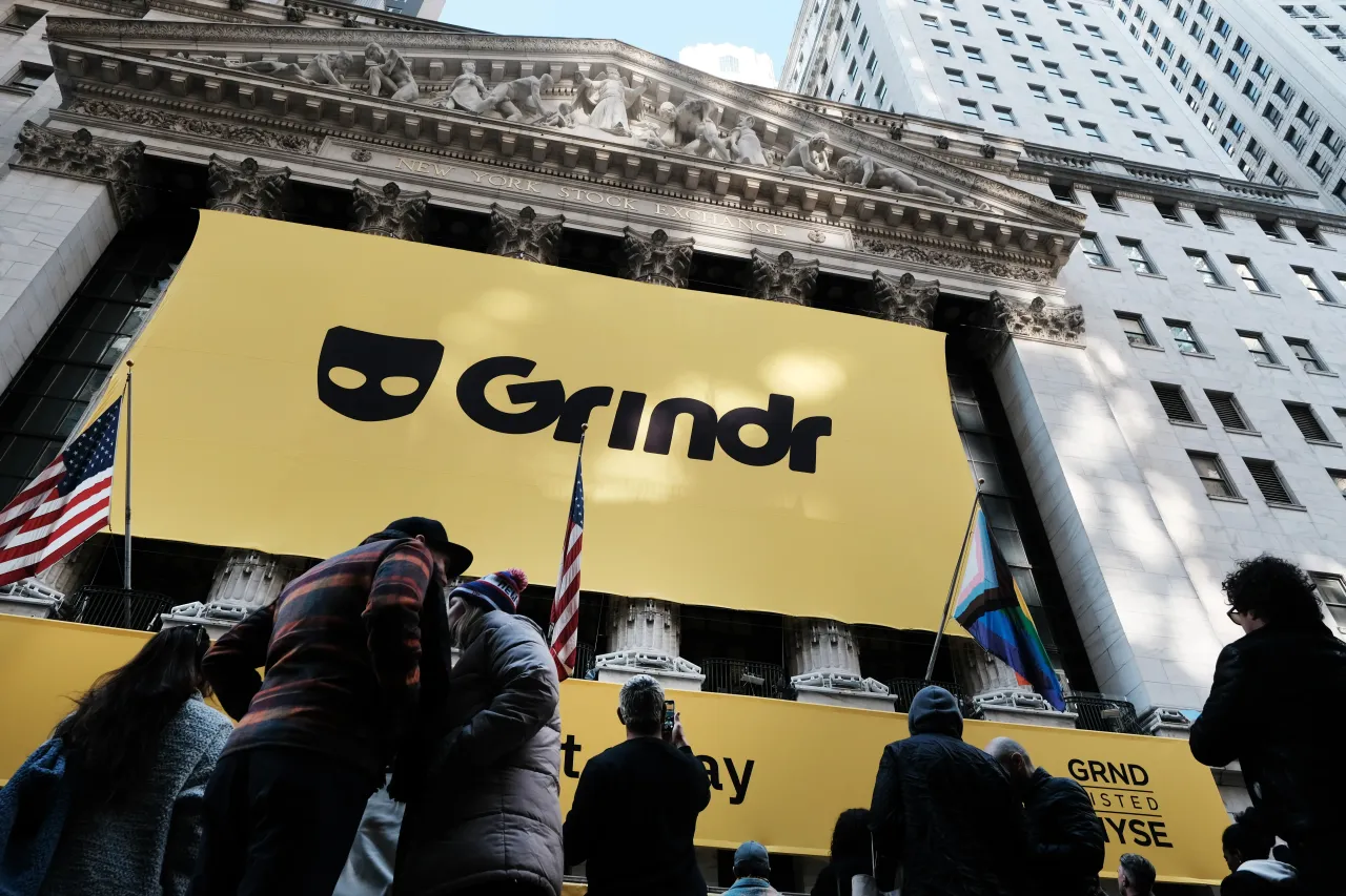 The LGBTQ social networking platform Grindr puts on a public show outside of the New York Stock Exchange (NYSE) as the company goes public on November 18, 2022 in New York City. (Photo by Spencer Platt/Getty Images)