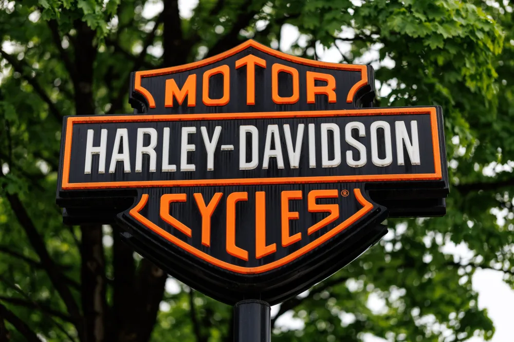 The brand logo and lettering of motorcycle manufacturer Harley-Davidson Motor Cycles can be seen on a company store in Munich (Bavaria). Photo: Matthias Balk/dpa (Photo by Matthias Balk/picture alliance via Getty Images)
