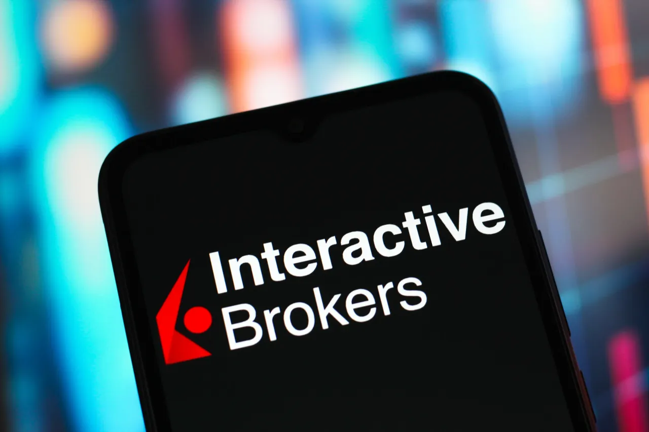 In this photo illustration, the Interactive Brokers Group logo is seen displayed on a smartphone screen. (Photo Illustration by Thomas Fuller/SOPA Images/LightRocket via Getty Images)