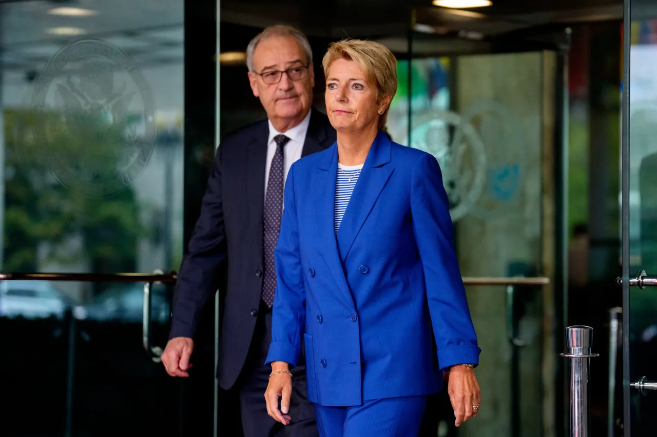 Swiss President Karin Keller-Sutter (R) and Vice President of the Swiss Federal Council Guy Parmelin leave the State Department on August 6, 2025 in Washington, DC