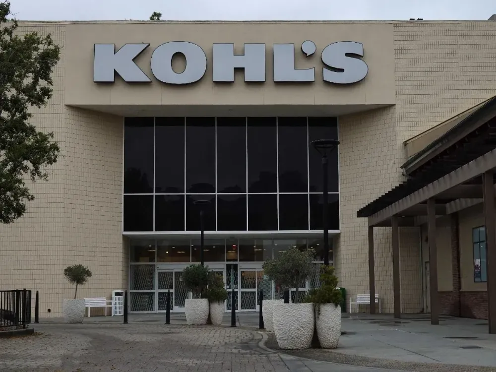 A Kohl's logo is displayed on a sign outside their department store on March 10, 2025 in San Diego, California. (Photo by Kevin Carter/Getty Images)