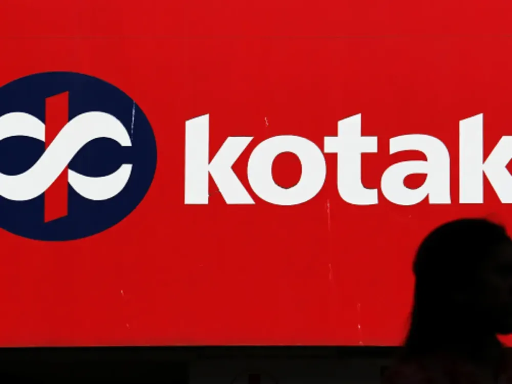 A woman stands in front of the Kotak Mahindra Bank branch in Mumbai, India on 11 March 2019. (Photo by Himanshu Bhatt/NurPhoto via Getty Images)