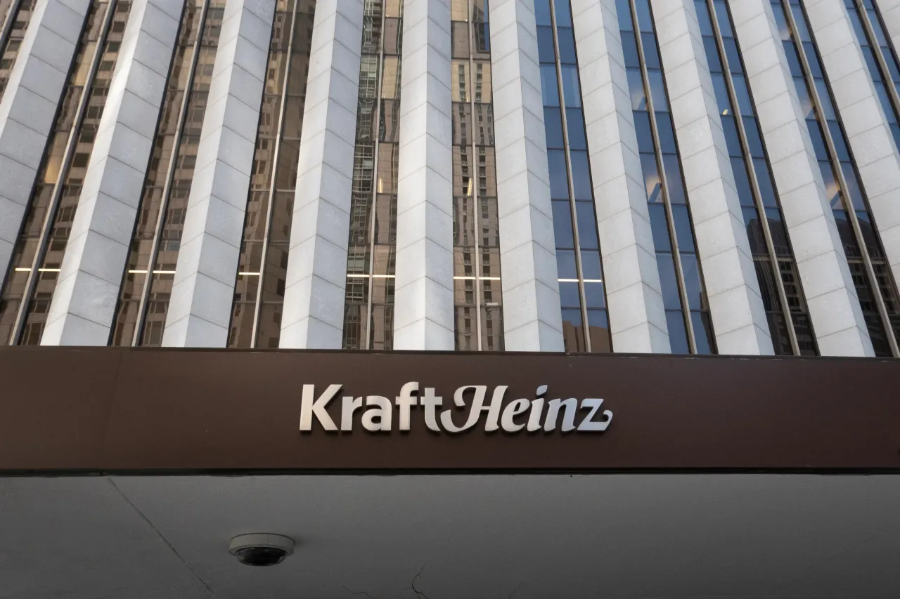 A sign outside of the Aon Center marks the location for the headquarters of Kraft Heinz in Chicago, Illinois.