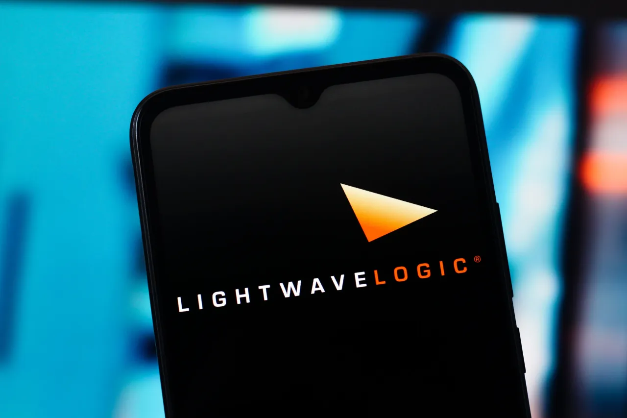 In this photo illustration, the Lightwave Logic logo is seen displayed on a smartphone screen. (Photo Illustration by Thomas Fuller/SOPA Images/LightRocket via Getty Images)