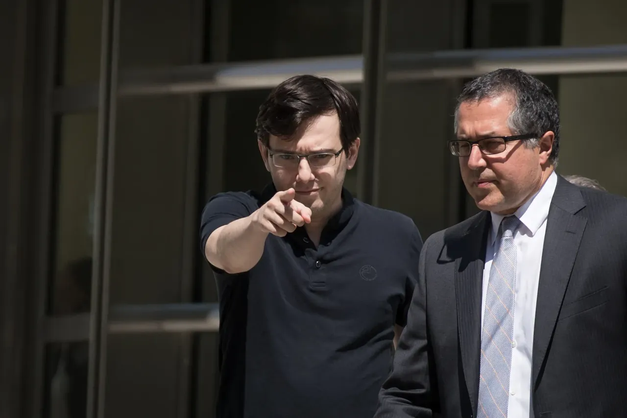 Former pharmaceutical executive Martin Shkreli points as he exits the courthouse after the jury issued a verdict in his case at the U.S. District Court, August 4, 2017 in the Brooklyn borough of New York City. (Photo by Drew Angerer/Getty Images)