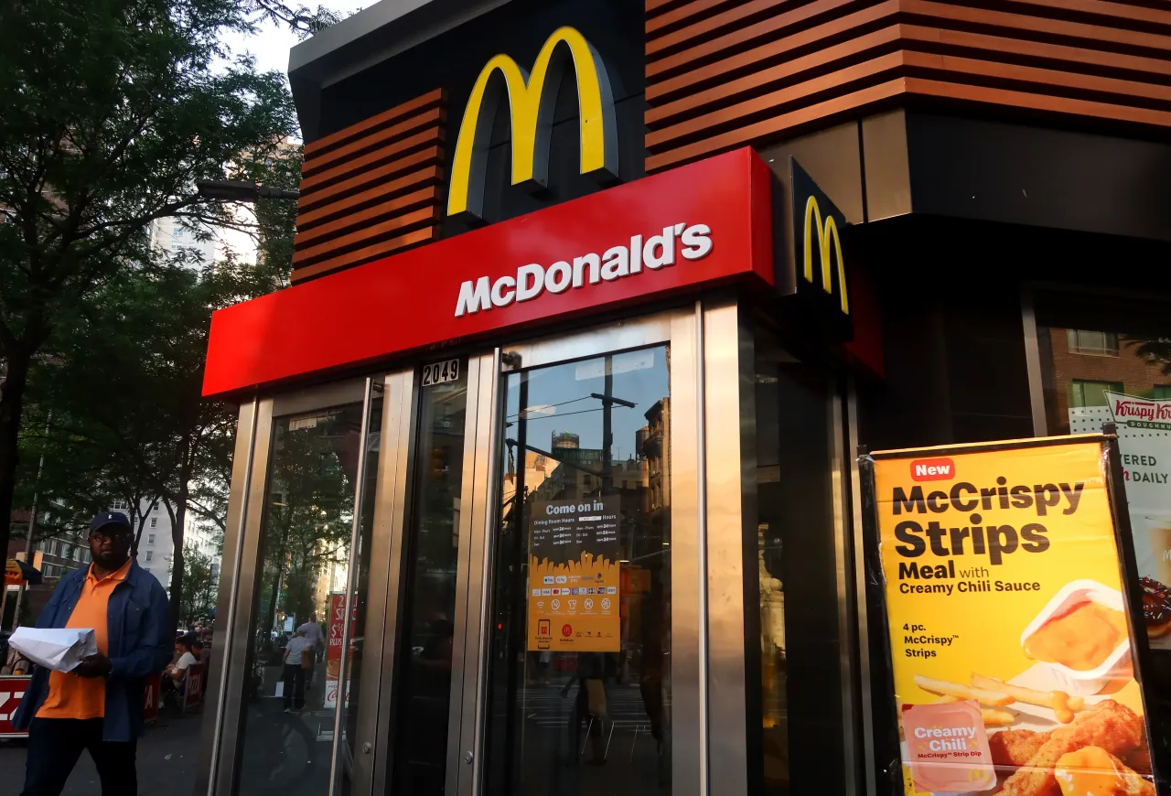 A person walks past a McDonald's restaurant on Broadway on June 11, 2025, in New York City