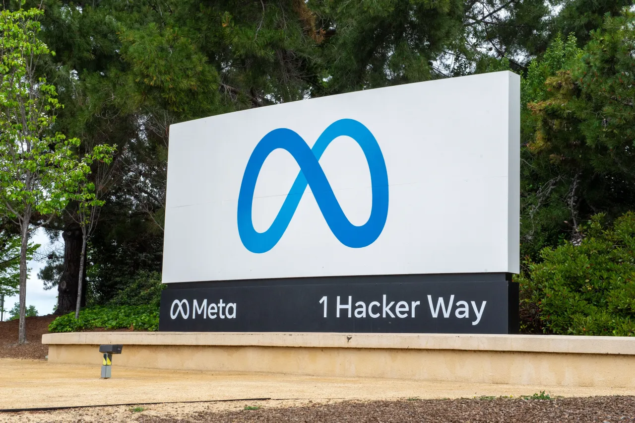 The logo of the Facebook group Meta can be seen near the company headquarters. Photo: Andrej Sokolow/dpa (Photo by Andrej Sokolow/picture alliance via Getty Images)