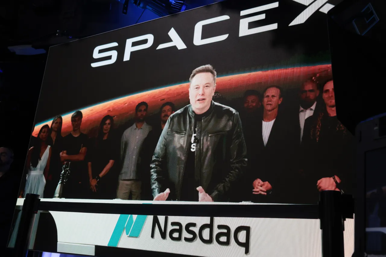 Elon Musk, founder and CEO of SpaceX, speaks via video before the ringing of opening bell at the Nasdaq Marketsite at the launch of the company's initial public offering (IPO) on June 12, 2026 in New York City.