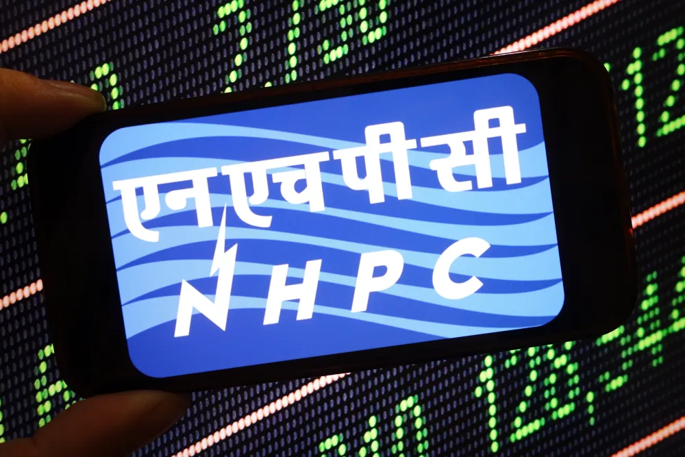 In this photo illustration, the NHPC Limited company logo is seen displayed on a smartphone screen. (Photo Illustration by Piotr Swat/SOPA Images/LightRocket via Getty Images)
