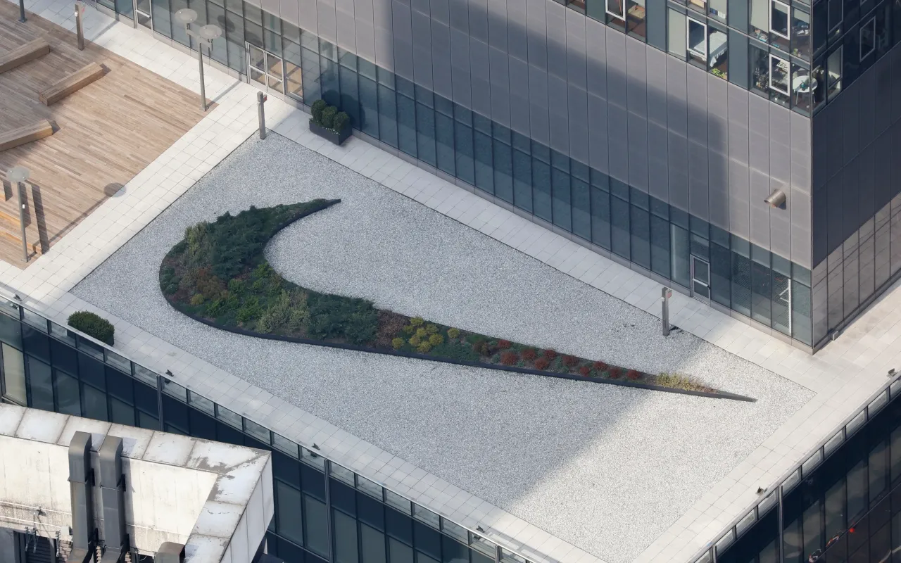 A garden in the shape of a Nike corporate logo is seen in an office building patio in midtown Manhattan on April 6, 2023, in New York City. (Photo by Gary Hershorn/Getty Images)