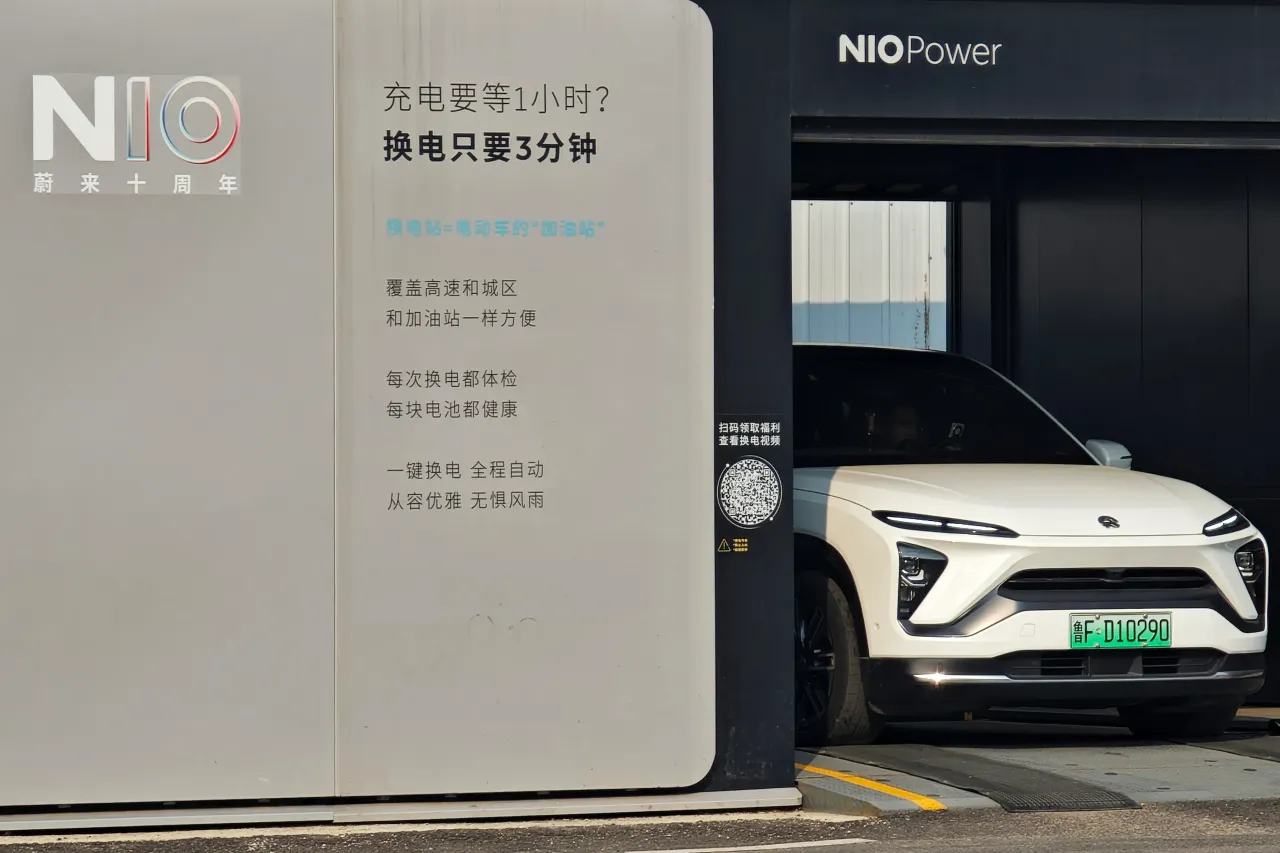 A NIO electric car gets its battery swapped at a NIO Power battery swap station in Yantai in east China's Shandong province Sunday, March 09, 2025. (Photo credit should read TANG KE / Feature China/Future Publishing via Getty Images)